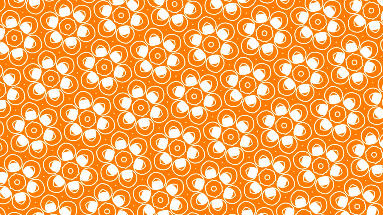 Graphic pattern that quickly changes color as it rotates clockwise and then anticlockwise, creating a hypnotic and stroboscopic effect.