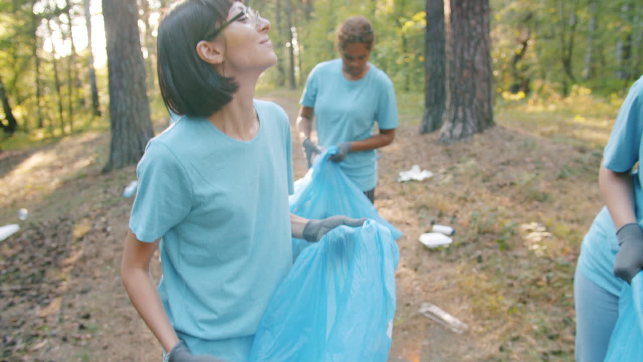 Volunteers Cleaning Up a Forest