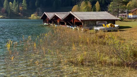 lauter lake with a wooden boathouse, very close to the bavarian town of mittenwald in germany