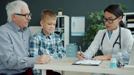 doctor consultation with a child and grandfather