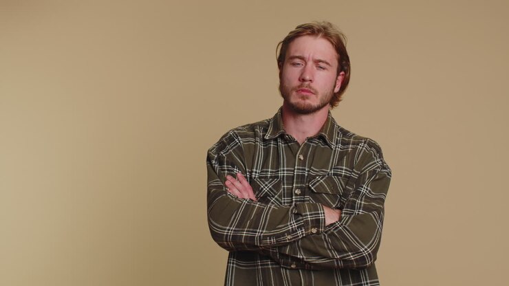 Dissatisfied man shaking head no, expressing irritation feeling bored disappointed results, bad news