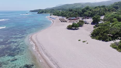 drone flying over playa el quemaito beach, barahona in dominican republic