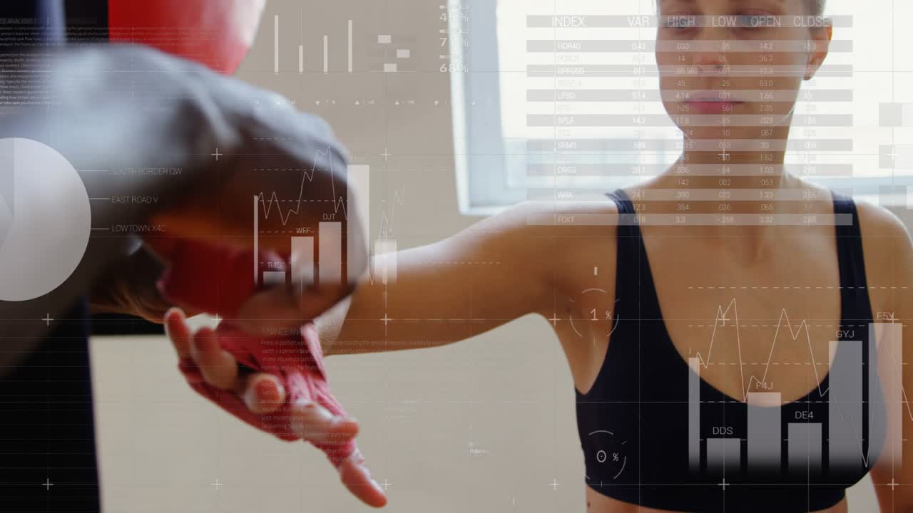 Coach guiding trainee hand, wrapping red tape HUD overlaying tightening holding boxing bag readying