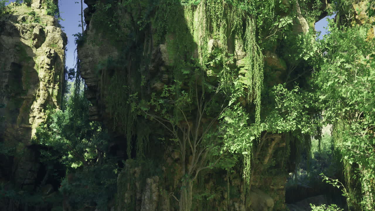 Lush greenery surrounds towering rock formations in a serene natural setting