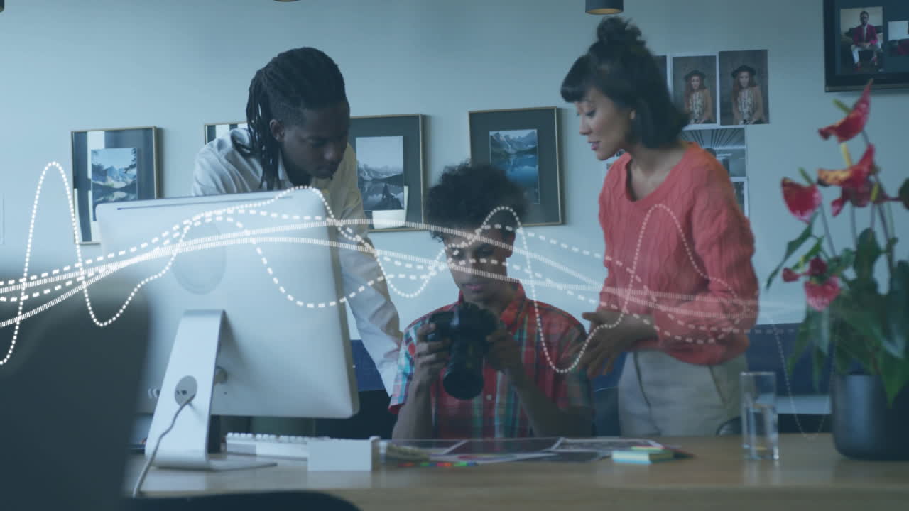 Animation of diagram over diverse colleagues talking in office