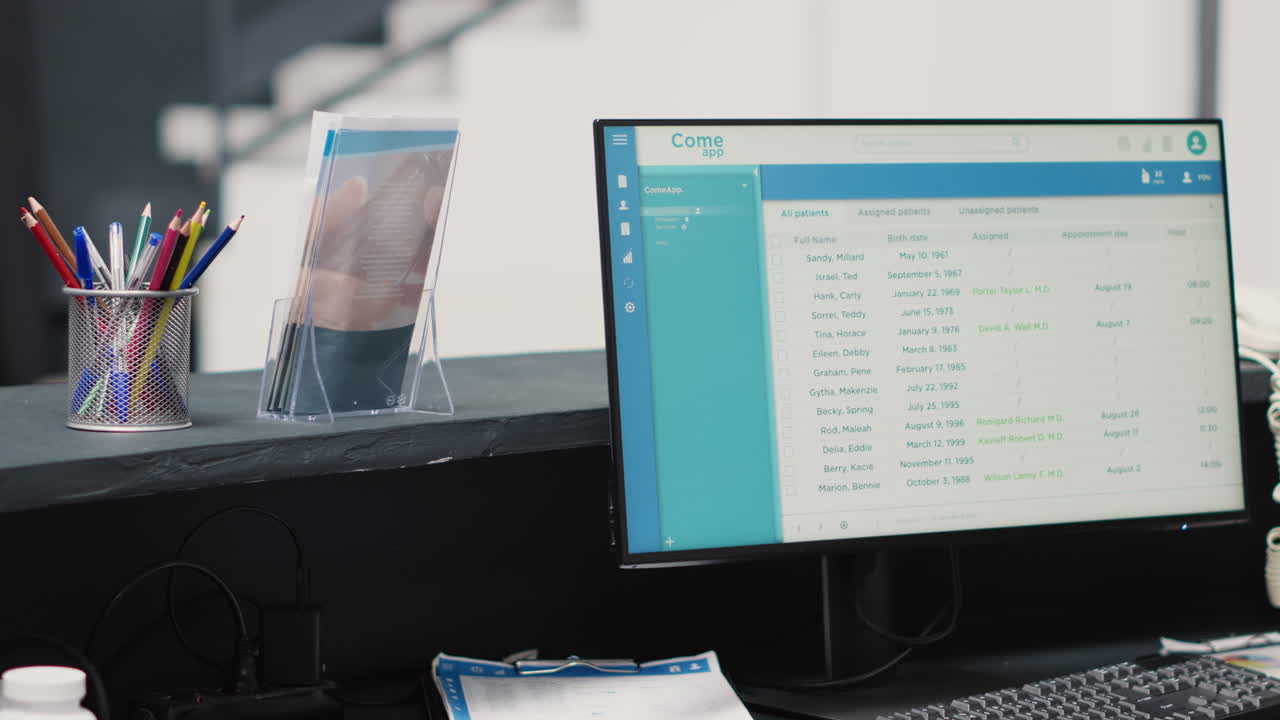 Medical appointments on computer at desk