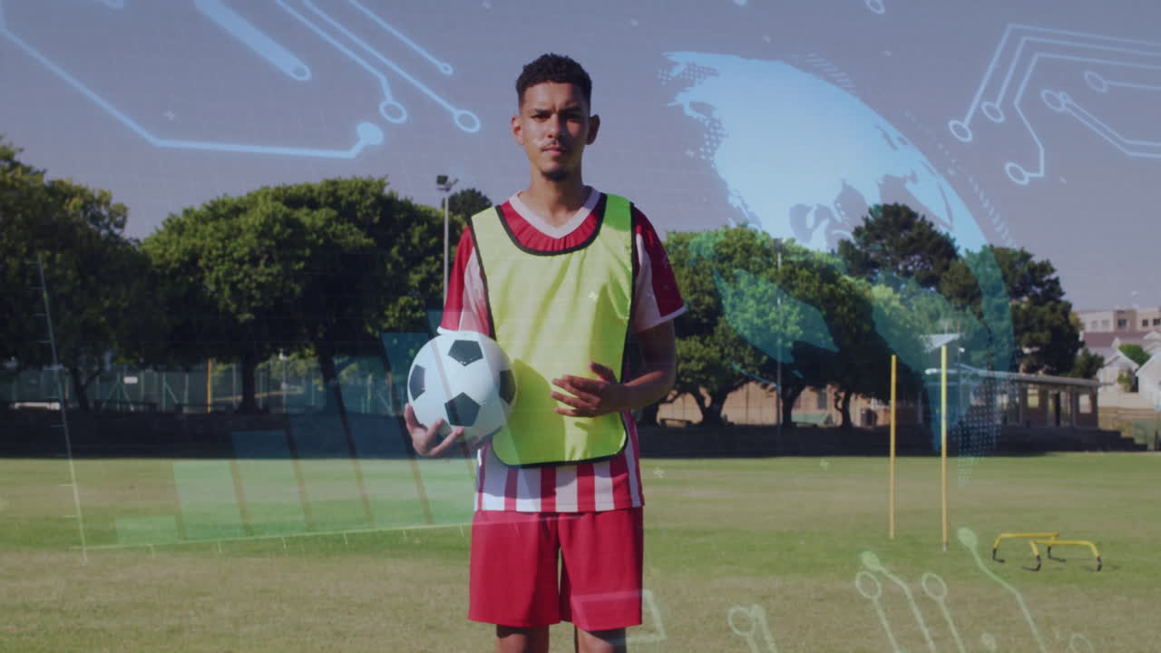 Soccer player holding ball with digital network and globe animation overlay