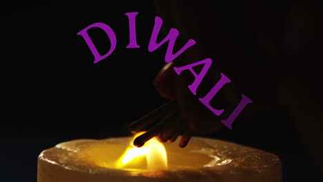 animation of diwali text over candle on black background