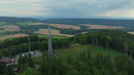 transmission tower on a hill. a sought-after tourist attraction used as a lookout tower. ústí nad orlicí, czech republic