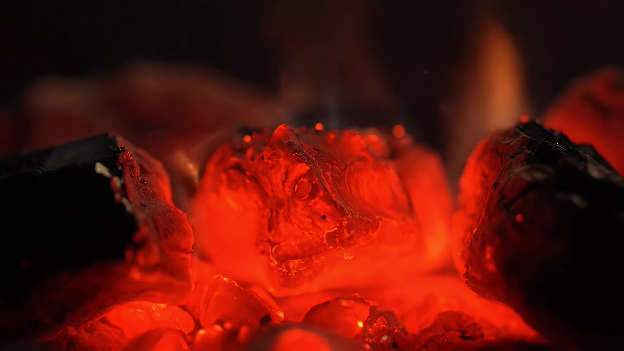 Glowing Hot Charcoal Embers Burning in a Grill