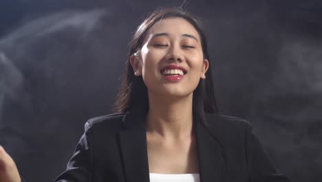 asian woman conductor