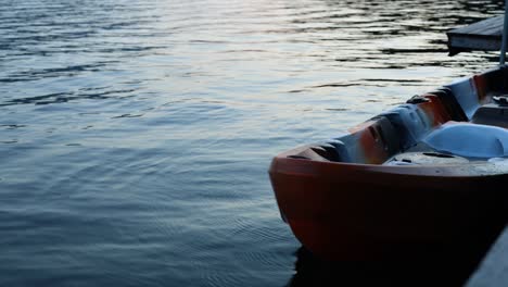 a serene scene of a boat floating on a lake