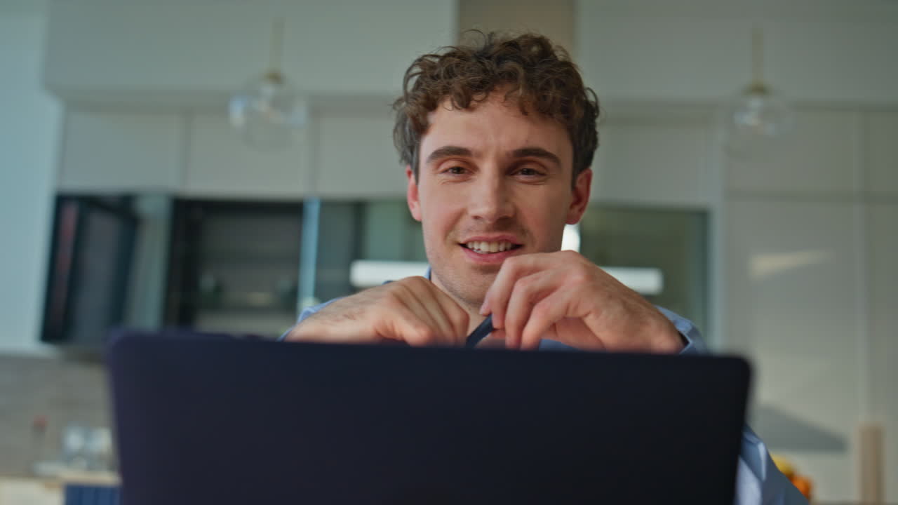 Closeup professional hands typing on laptop at remote office. Smiling worker