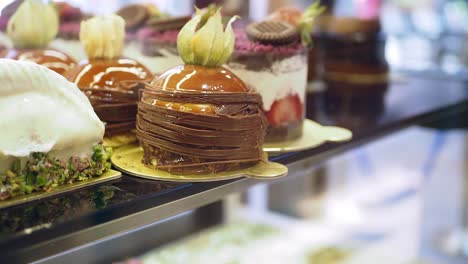 close-up of a display case filled with delicious pastries and desserts