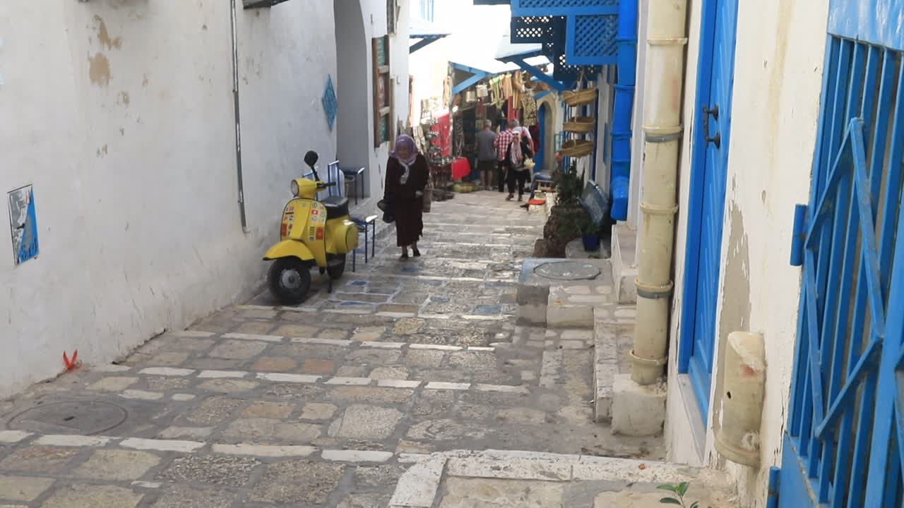 An ancient tunisian city with traditional arabic architecture at sunset, aerial view