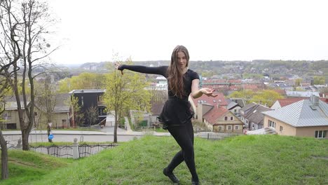 Dance-performance-by-a-talented-young-woman-in-a-park