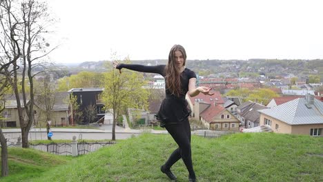 dance performance by a talented young woman in a park