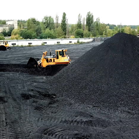 aerial view of big pile of coal. extractive industry, anthracite.