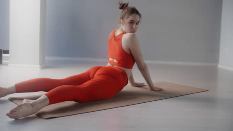 woman performing a splits yoga pose