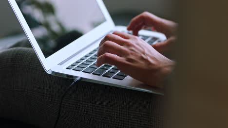 woman hands typing laptop keyboard