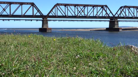 A-steel-train-bridge-behind-a-beautiful-blue-sky