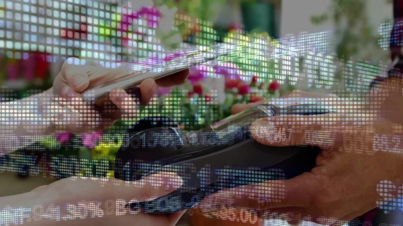 Kunde som holder telefonen mot leverandørens POS, starter betaling med rullende datanett over blomsterhandler