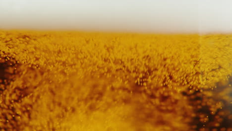 close-up of beer bubbles