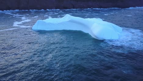 iceberg floating near the coast