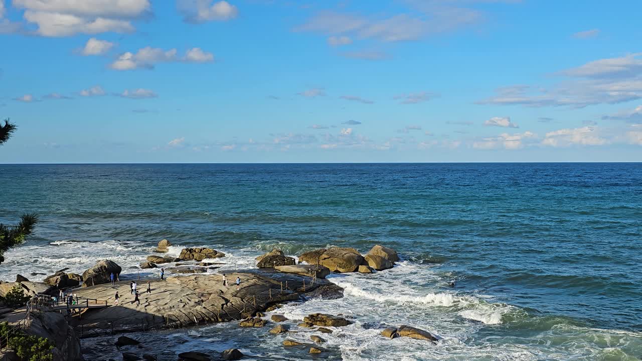 Stunning Ocean View with Rocks and People