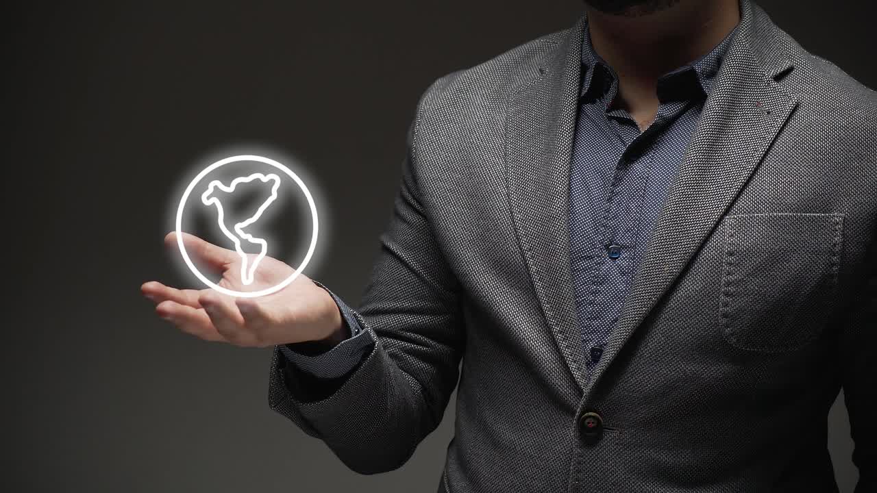international business concept. a business person holding up the world hologram