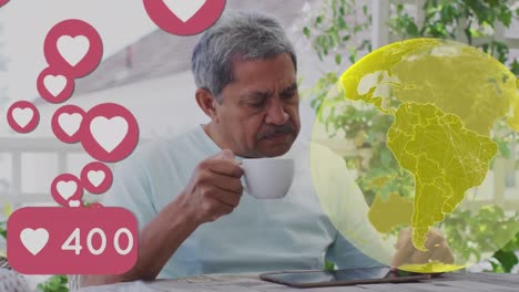 globe and multiple heart icons with increasing numbers against senior man using digital tablet