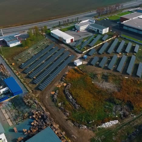 solar panels with sunny sky above. blue solar panels. background of photovoltaic modules for renewable energy. view from above