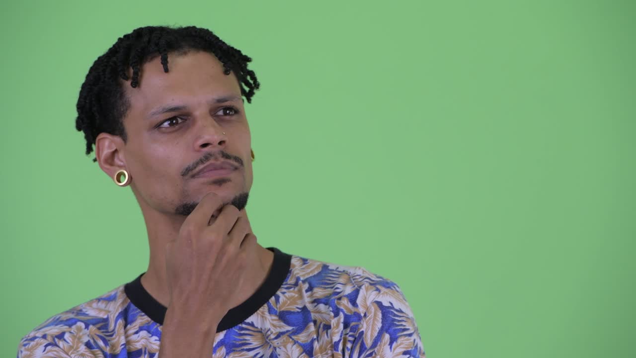 Young handsome African man with dreadlocks