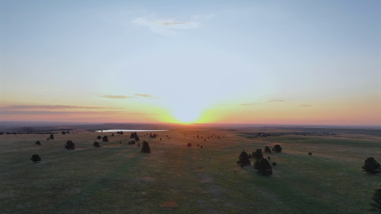 Boulder Colorado sunrise early morning golden hour sun Denver Front Range plains Arvada Golden aerial drone spring summer Marshall Lake Baseline Reservoir Eldorado Canyon Greenbelt Plateau forward