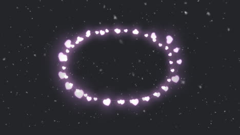 animation of heart frame over snow falling