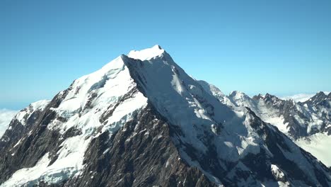 Aoraki-Mount-Cook-snow-capped-peak-summit,-Southern-Alps,-New-Zealand-from-airplane-scenic-flight