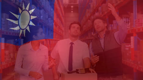 animation of flag of taiwan over diverse colleagues discussing in warehouse