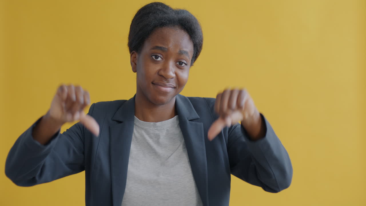 Woman giving thumbs down