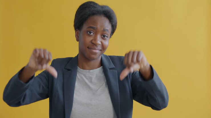 Woman giving thumbs down
