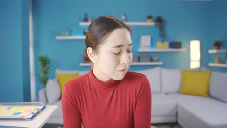 paranoid asian woman is afraid of hallucinations.