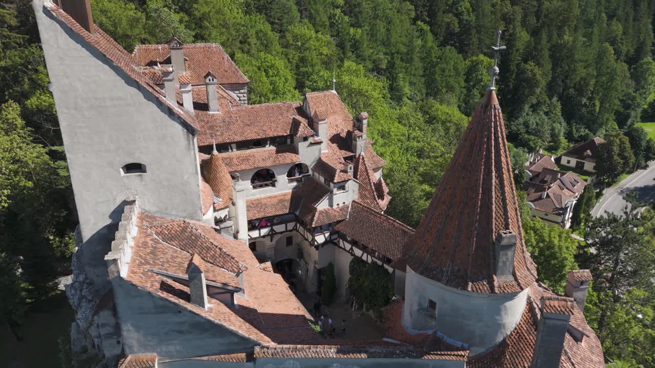 Drone orbit capturing Bran Castle and its inner courtyard from above
