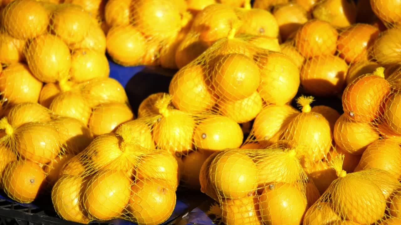 naranjas en bolsas de red
