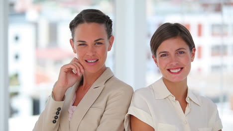 Two-business-women-standing-together