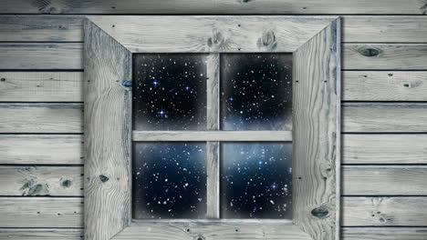 animación de la nieve cayendo vista a través de la ventana