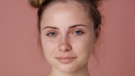 close up portrait of smiling caucasian teenage woman.