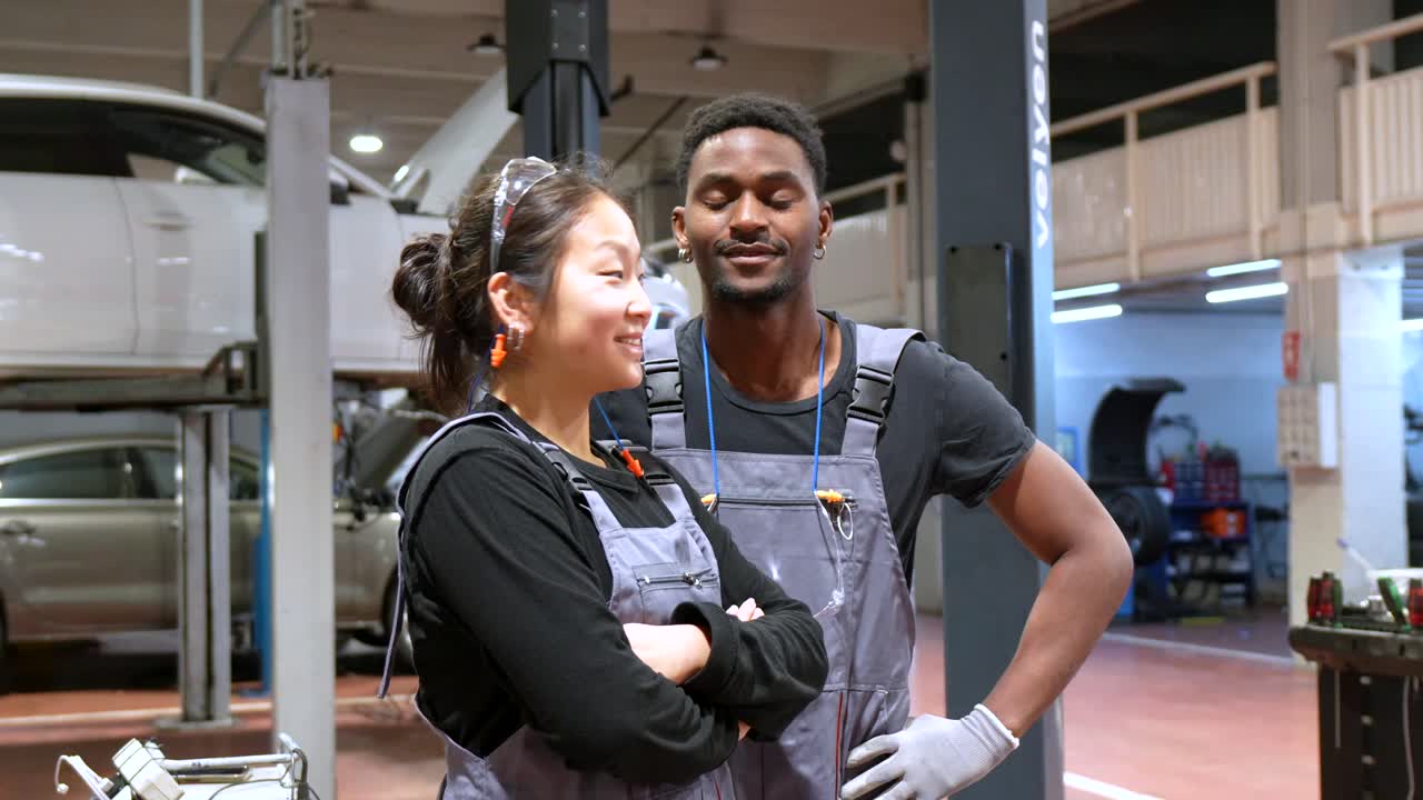 Auto Mechanics in a Car Repair Shop