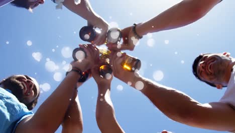 group of friends cheering on sunny day