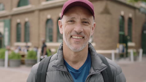 portrait-of-mature-attractive-caucasian-man-laughing-cheerful-enjoying-travel-vacation