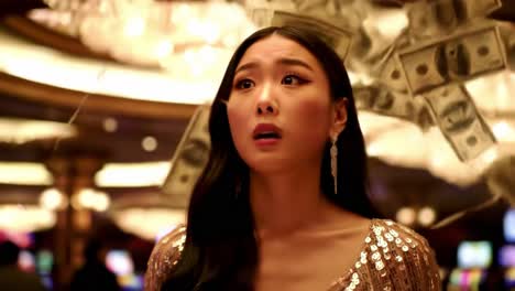 astonishment in a glittering casino: a woman's captivating reaction to falling money amidst luxurious décor and vibrant lights
