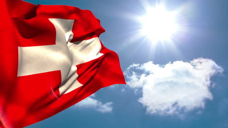 la bandera nacional suiza ondeando